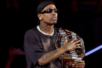 The former WWE star explains why Travis Scott was an issue with the WWE WrestleMania main event