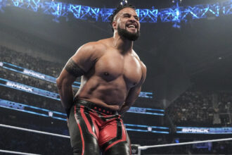 WWE's Tama Tonga was injured and walked by the sidelines