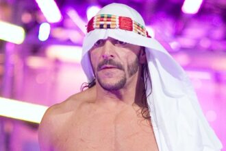 ECW Legend Sandman calls matches in the ring, contrasting with AEW Style and Sabu's behavior