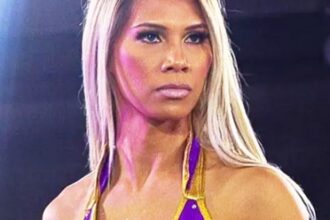 Gisele Shaw reacts to Scott Damore's rebound after victory in the MLP women's title