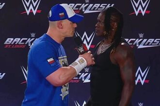 John Cena attacks R-Truth with attitude adjustment during WWE Backlash press conference