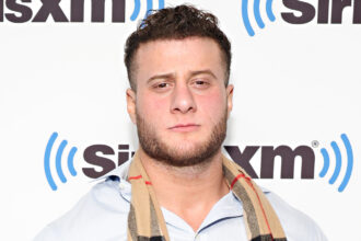 MJF enjoys the emotional promotion of the winners of the AEW Owen Hart Cup