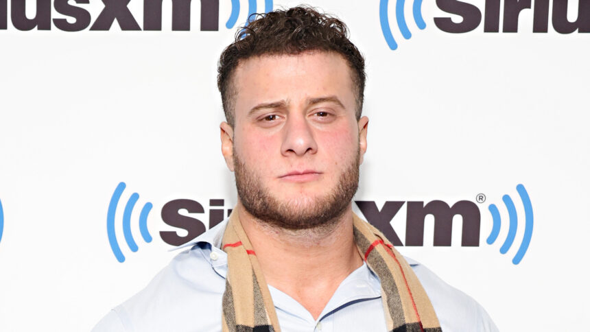 MJF enjoys the emotional promotion of the winners of the AEW Owen Hart Cup