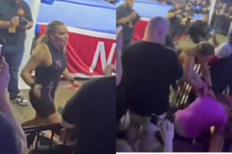 Natalia attacks Heclar after the defeat of the NWA Crockett Cup
