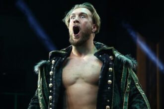 Osprea looks back at his memorable early match with his current AEW co-star curb