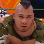 El Hijo Del Vikingo holds the mega championship in a wild match at WWE X AAA Worlds Collide