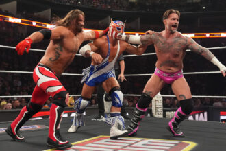 Clues about El Grande Americano's identity have been discovered in WWE RAW