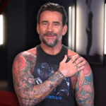 The WWE Star reveals the personal story behind his 52 body art