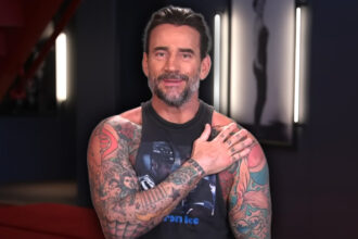 The WWE Star reveals the personal story behind his 52 body art