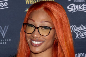 Former WWE NXT star Jakara Jackson returns to TNA and officially signs under his new name