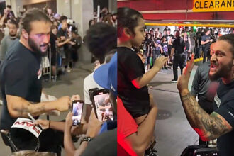 Fans gather behind Karrion Kross after the look of WWE RAW