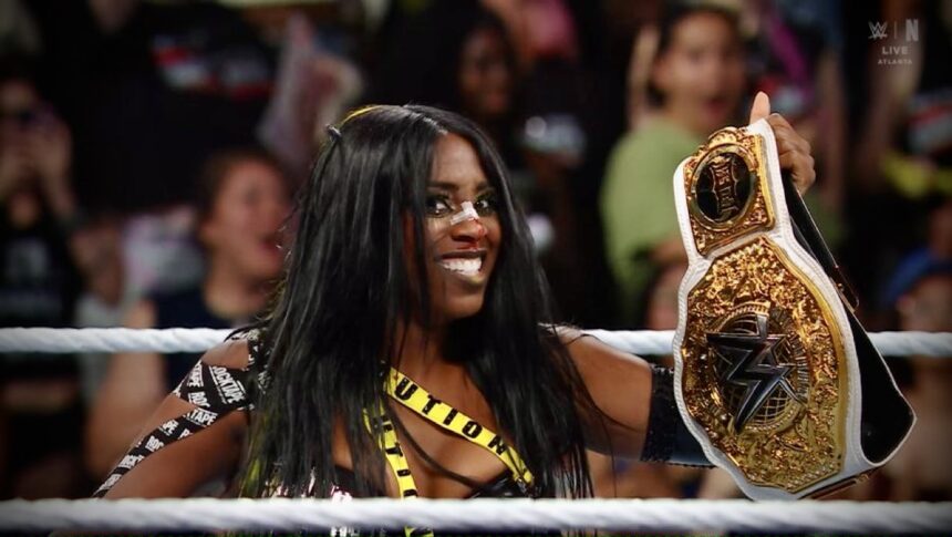 Naomi Cashes at MITB to win the Women's World Championships in Evolution