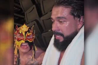 Rey Fenix ​​and Andrade call for a shot of WWE Tag Team Gold after SmackDown's victory