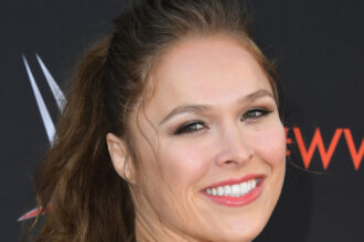The strange Ronda Rousey enqueued that made Booker wrong