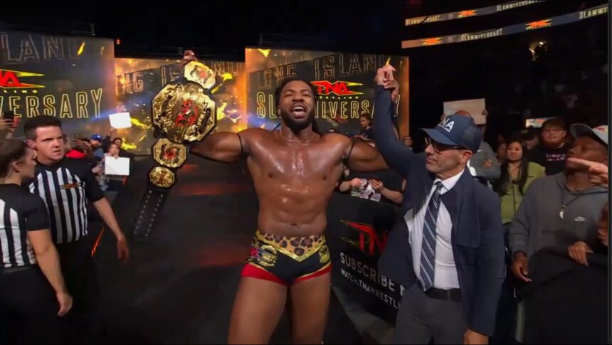 Trick Williams holds the TNA world title at Chaos Slamie Surrey Main Event