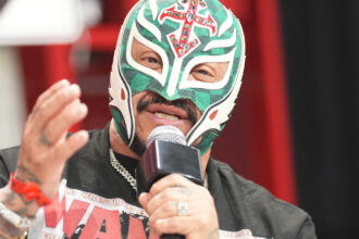 WWE's Rey Mysterio contrasts his experience with Monday's night war politics