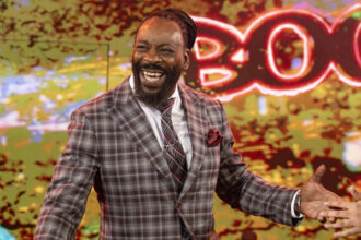 Booker T says the WWE champion is now "knocking out of the park"