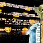 Cody Rhodes reacts to the entrance to an emotional summer slam with Dusty Rhodes tribute