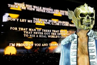 Cody Rhodes reacts to the entrance to an emotional summer slam with Dusty Rhodes tribute