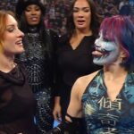 Becky Lynch blindsides AJ Lee after being added to Women's War Games match on WWE SmackDown on 11/21