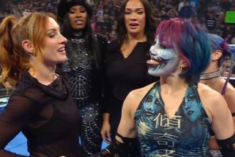 Becky Lynch blindsides AJ Lee after being added to Women's War Games match on WWE SmackDown on 11/21