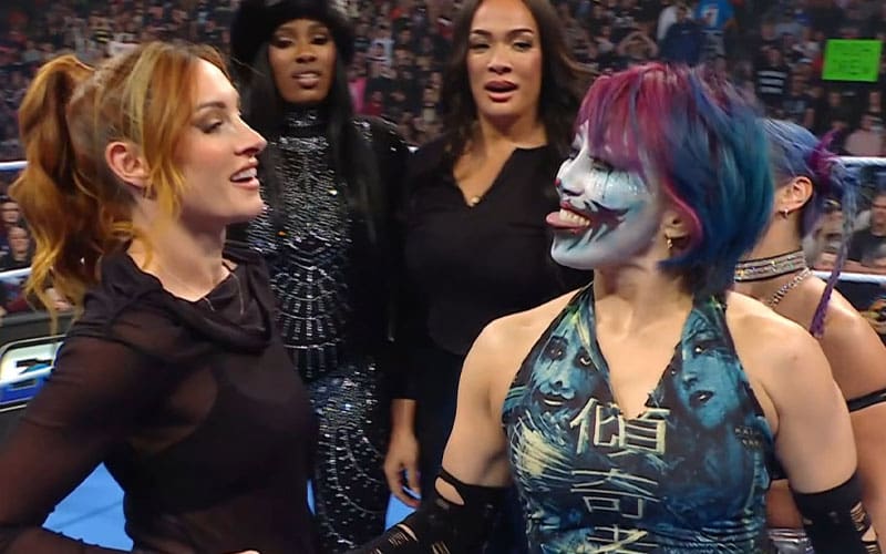 Becky Lynch blindsides AJ Lee after being added to Women's War Games match on WWE SmackDown on 11/21