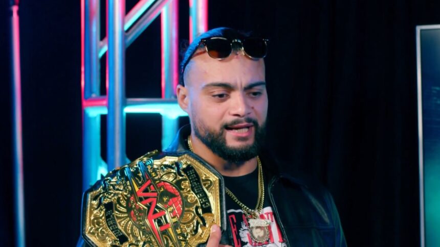 Mike Santana with the TNA title. Photo: TNA