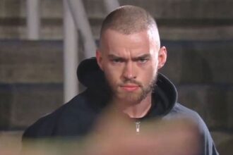 Austin Theory reveals he is WWE's masked man after RAW main event