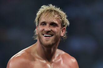 Logan Paul shares his theory on why Travis Scott stopped working with WWE