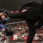 The identity of the masked man who helped Vision on WWE RAW is officially revealed.