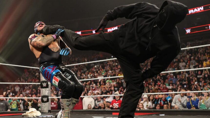 The identity of the masked man who helped Vision on WWE RAW is officially revealed.